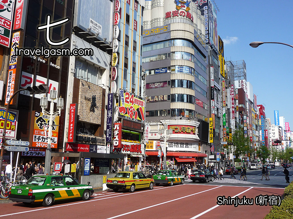 Taxis line up on major streets in the "downtown" Shinjuku district of Tokyo.