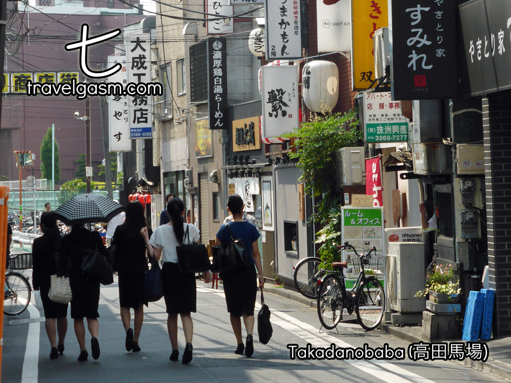 Students walk through the student area of Takadanobaba.